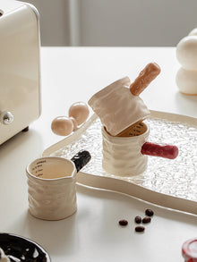 Red ceramic coffee measuring cup with 90ml capacity