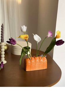 Bread shaped ceramic flower vase for decorative floral arrangements