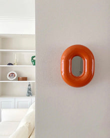 Hot pink donut-shaped makeup mirror for vanity or dressing table