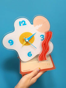 Egg-shaped acrylic desktop clock for home or office decor
