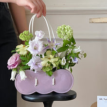 Purple handbag-shaped ceramic flower vase for decorative home styling