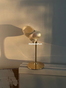 Set of two handmade gold conch wine glasses
