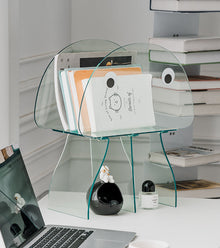 Jellyfish-inspired acrylic bookshelf with orange head and legs
