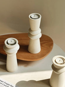 Set of three minimalist ceramic candle holders for modern home decor