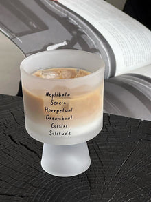 Lettered glass coffee cup with modern typography design
