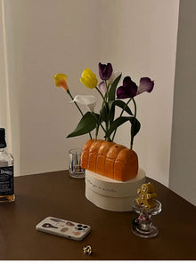 Bread shaped ceramic flower vase for decorative floral arrangements