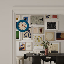 Double-sided round wall clock with bracket-mounted retro design