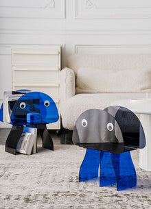 Jellyfish-inspired acrylic bookshelf with orange head and legs