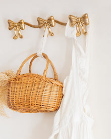 Vintage bow triple wall hook with antique-style finish