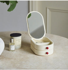 Cream jewelry box with built-in mirror and dual-layer storage