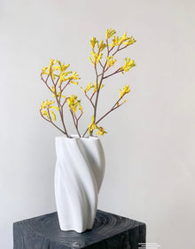 White twist ceramic vase with sculptural modern design