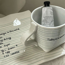 Notebook-inspired ceramic coffee cup with matching tray
