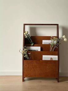 Vintage wooden magazine rack in brown for books and magazines