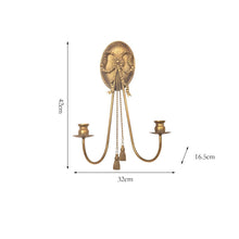 French style gold iron wall candle holder with bow detail