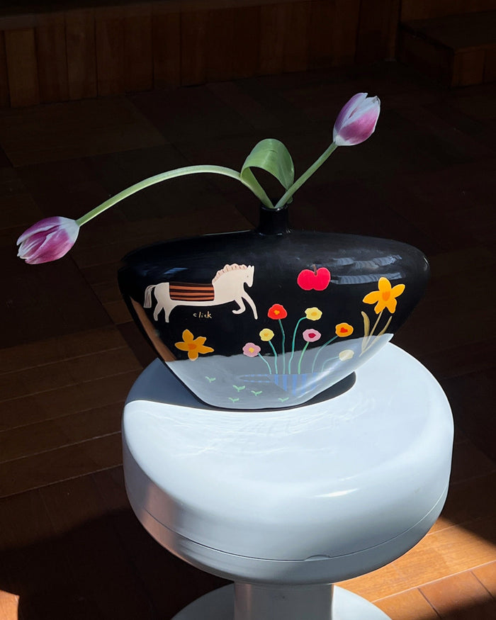 Ceramic horse vase with decorative floral and fruit motifs