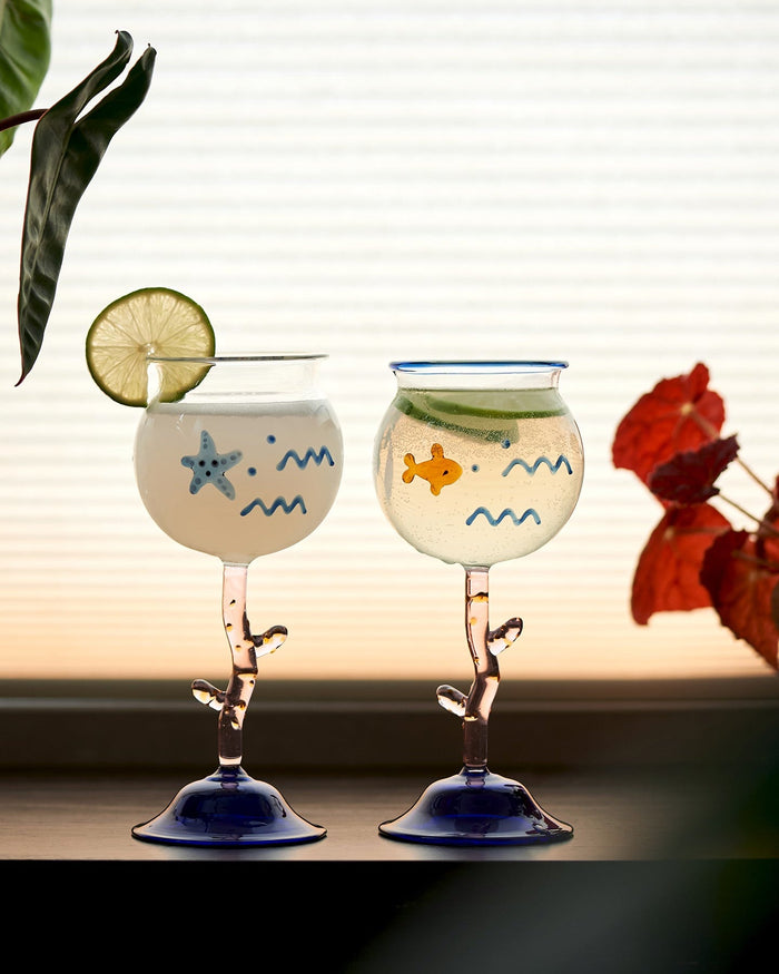 Ocean-inspired wine glass with fish motif and coral-style stem