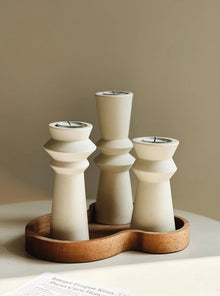 Set of three minimalist ceramic candle holders for modern home decor