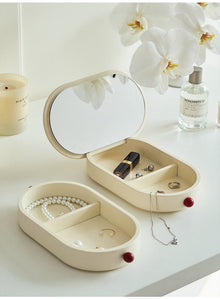 Cream jewelry box with built-in mirror and dual-layer storage