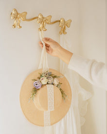 Vintage bow triple wall hook with antique-style finish