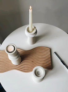 Set of three minimalist ceramic candle holders for modern home decor