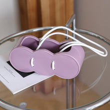Purple handbag-shaped ceramic flower vase for decorative home styling