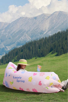 Inflatable outdoor lounger sofa for portable seating at the beach, campsite or garden