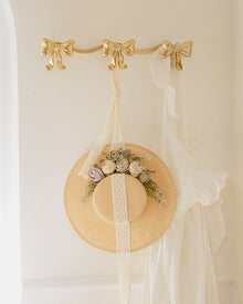 Vintage bow triple wall hook with antique-style finish