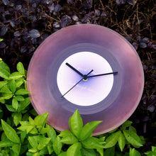 Black vinyl record-inspired clock with stand for wall or tabletop display