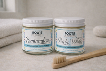 Jar of remineralizing herbal tooth powder for fluoride-free oral care