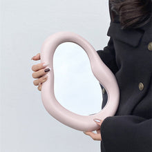 Beige irregular shaped vanity mirror for makeup and dressing table use