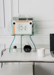 Jellyfish-inspired acrylic bookshelf with orange head and legs
