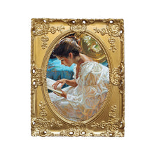 Baroque style framed wall painting with ornate floral detailing