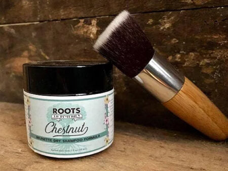 Herbal dry shampoo with flat brush for reddish-brown hair
