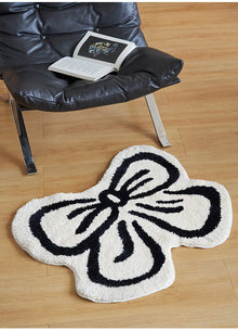 Black and white bowknot area rug with soft tufted texture