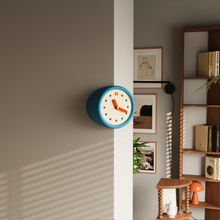 Blue corner clock with dot dial for modern home decor