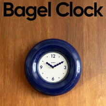 12-inch red bagel-inspired wall clock with minimalist dial