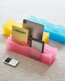 Bright blue wave acrylic magazine organizer for books, tablets, and desk essentials