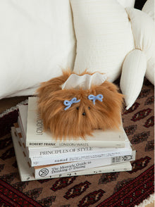 White fluffy dog tissue box cover with decorative bow clips