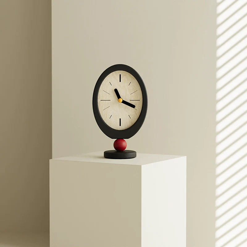 Retro oval wooden desktop clock with red sphere base in black