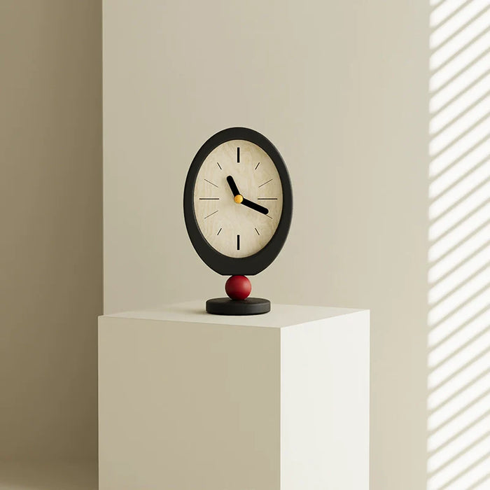 Retro oval wooden desktop clock with red sphere base in black