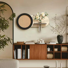 3D sandstone wall art with rock panel, glass vase, and artificial flower accent