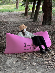 Inflatable outdoor lounger sofa for portable seating at the beach, campsite or garden