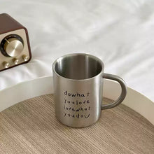 Stainless steel letter mug with black English text