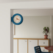 Double-sided round wall clock with bracket-mounted retro design