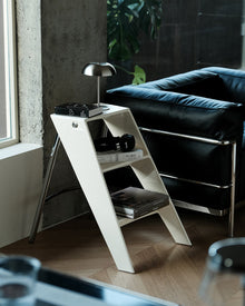 Grey foldable acrylic and metal ladder side table for small spaces
