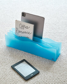 Bright blue wave acrylic magazine organizer for books, tablets, and desk essentials