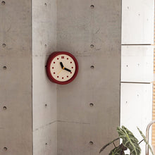 Red corner wall clock with minimalist dots dial for a 90-degree wall edge