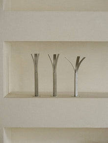 Minimalist stainless steel bud vase for modern tabletop decor