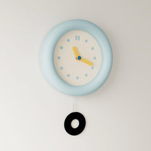 Baby blue silent wall clock with minimalist dial and pendulum