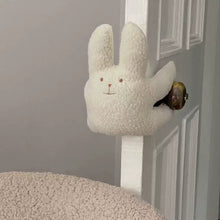 Plush cat door stop for a child’s room or nursery
